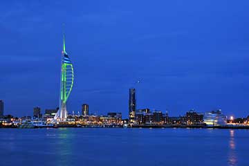 portsmouth area guide banner showing spinnaker tower in night